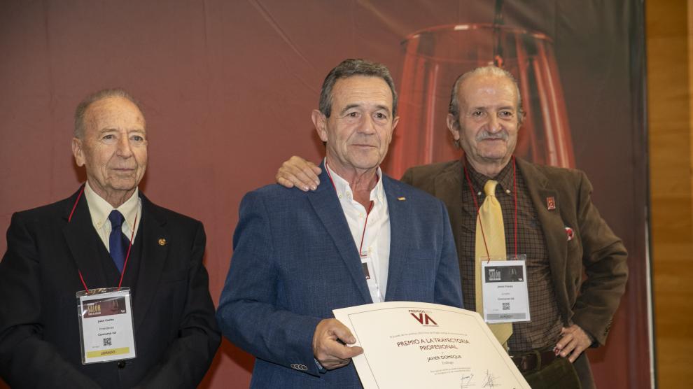 Juan Cacho, Javier Domeque, que recibió un reconocimiento, y Jesús Flores.