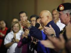 Chávez regresa a Caracas y dice que ha terminado el tratamiento de quimioterapia