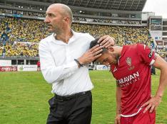 Ranko Popovic trata de consolar a un desolado José Fernández.