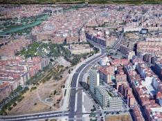 En primer plano, recreación de la promoción, que cuenta con tres edificios de seis, diez y diecinueve alturas, sobre una imagen aérea de Zaragoza.