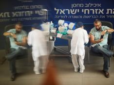 A man receives his third dose of a coronavirus disease (COVID-19) vaccine at Sourasky Medical Center (Ichilov Hospital) in Tel Aviv