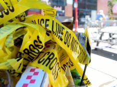 FILE PHOTO: Police tape is trashed at the scene of a shooting in Philadelphia