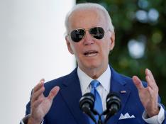 U.S. President Joe Biden speaks before signing two bills aimed at combating fraud in the COVID-19 small business relief programs