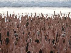 People stand naked on Sydney's Bondi Beach to raise awareness of skin cancer