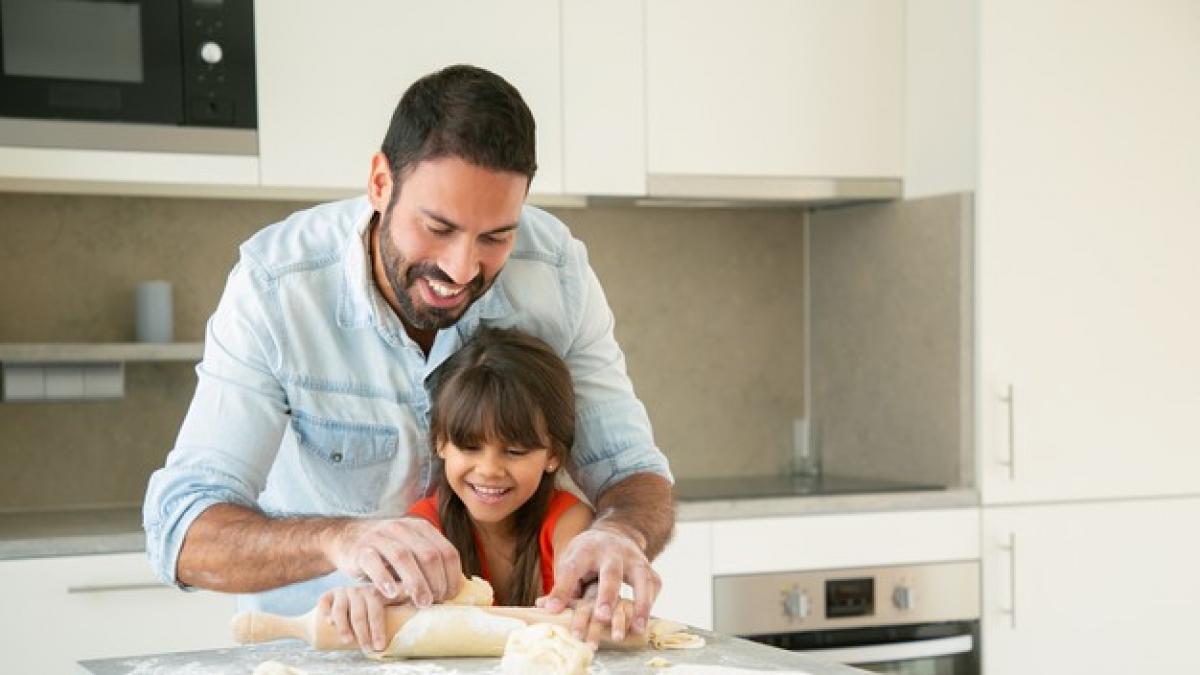 His father in the kitchen